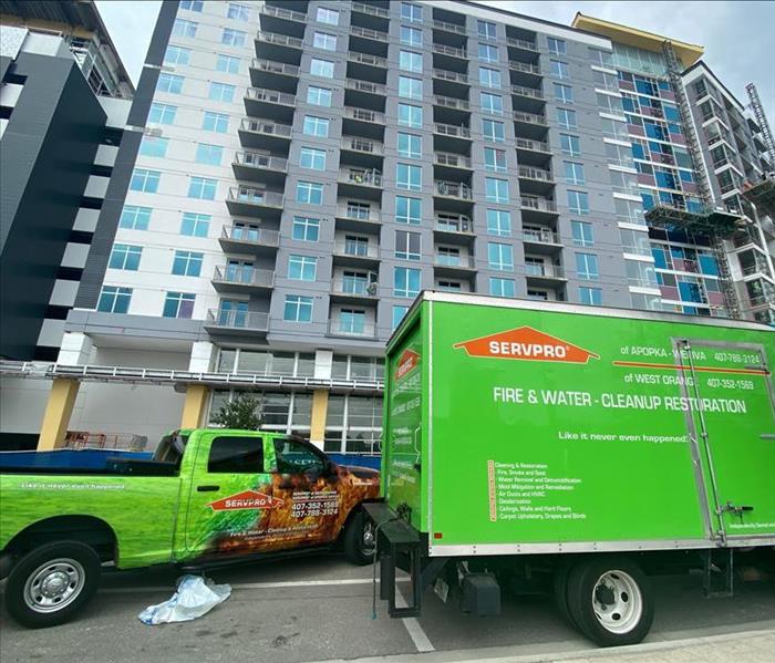 Servpro Vehicles in front of commercial building